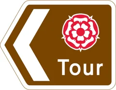 Direction along a route passing through places of interest recognised by a regional tourist board or the English tourist board — UK road sign