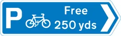 Direction and distance to a free parking place for pedal cycles — UK road sign