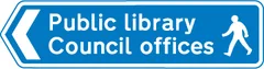 Direction of route to destination shown for pedestrians — UK road sign