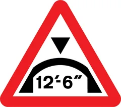 Maximum headroom of 12'-6'' at arch bridge ahead — UK road sign