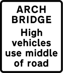 High vehicles to use middle of road at arch bridge ahead — UK road sign
