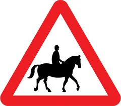 Example of UK warning signs: Accompanied horses or ponies likely to be in or crossing road ahead