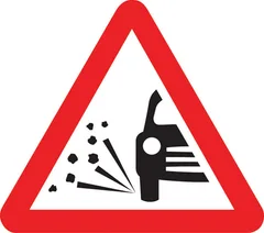Example of UK road works signs: Loose chippings on road ahead