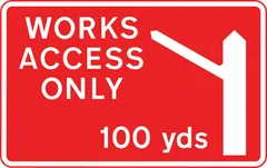 Direction to be taken by road works or construction traffic to an access to a works site 100 yards ahead — UK road sign