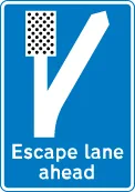 Escape lane ahead for vehicles unable to stop on a steep hill — UK road sign