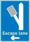 Direction to escape lane to the left for vehicles unable to stop on a steep hill — UK road sign