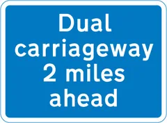 Distance of 2 miles to a section of dual carriageway ahead — UK road sign